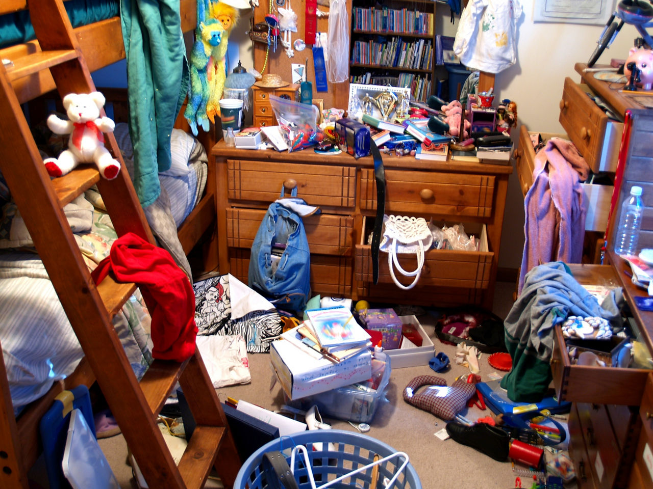 Bedroom with tons of clutter